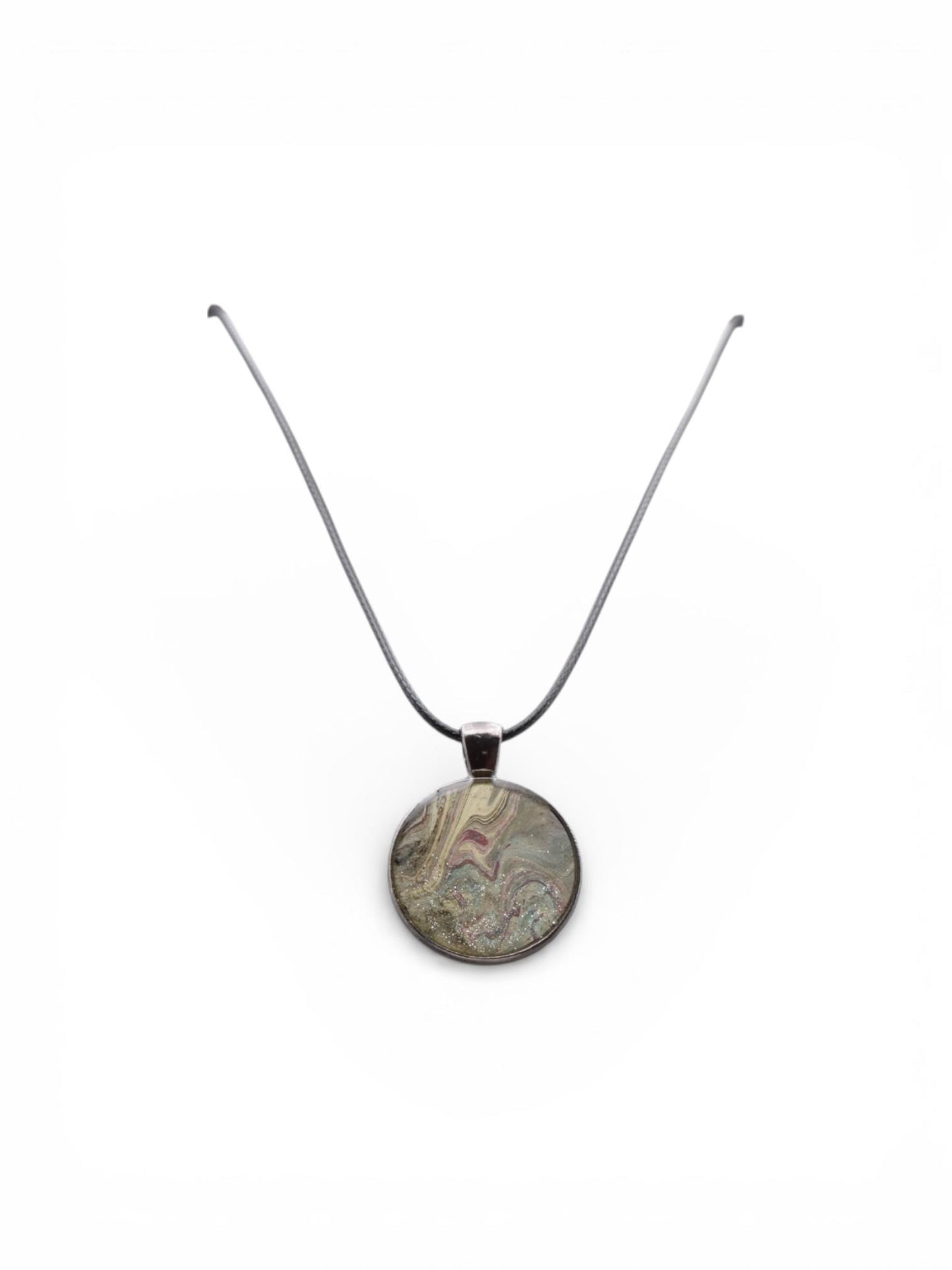 English Tea, Porthole of Joy necklace with a round pendant on a white background